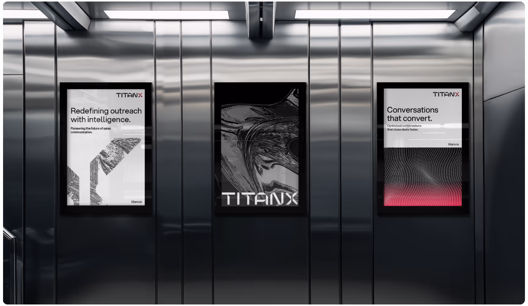 Three framed posters on an elevator wall. Left poster: "Redefining outreach with intelligence." Center: Abstract design with "TITANX." Right: "Conversations that convert."