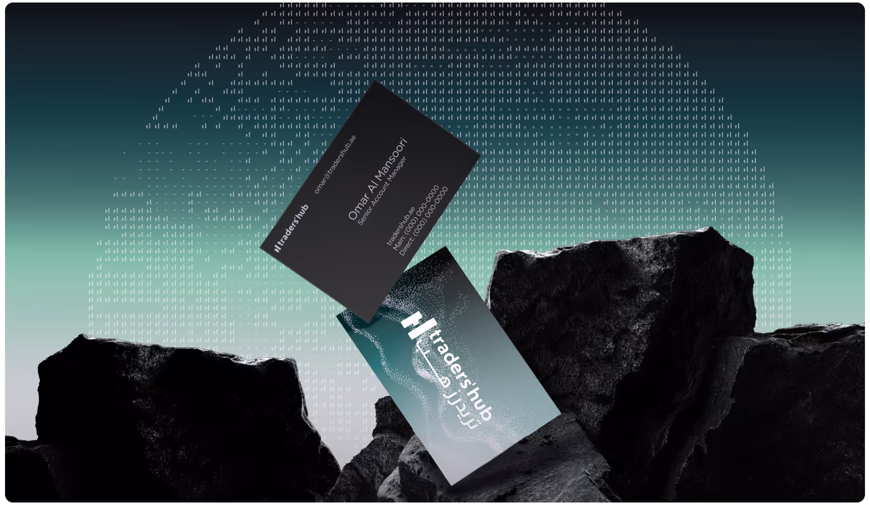 The image shows two business cards balanced on dark rocks. The background features binary code and a gradient from teal to black, creating a tech-inspired tone.