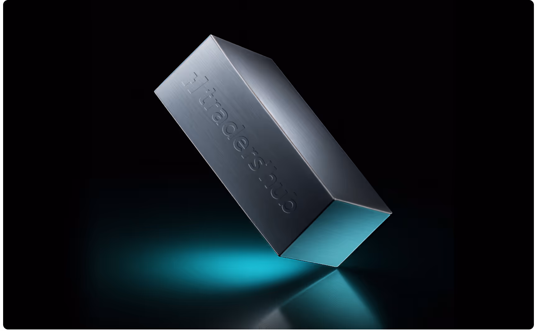A sleek, metallic rectangular block with engraved text "tradershoo" is shown against a dark background. It casts a teal light reflection, conveying a futuristic, high-tech feel.