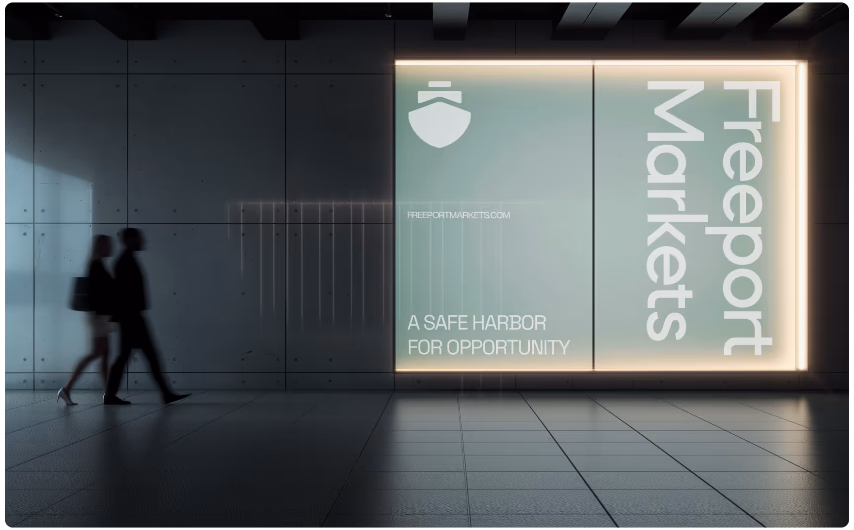 Silhouetted figures walk past a modern, illuminated wall display reading "Freeport Markets - A Safe Harbor for Opportunity" with a shield logo. 