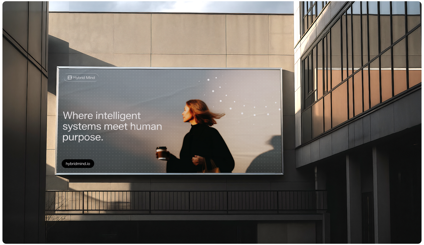 Billboard with a woman holding a coffee cup, against a modern building backdrop and a slogan: "Where intelligent systems meet human purpose."