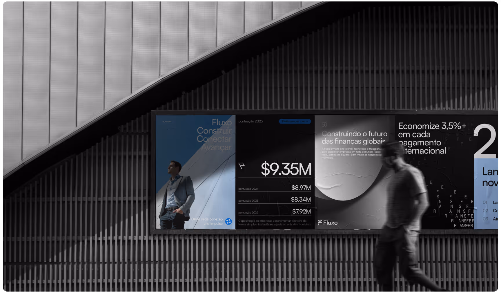 Fluxo digital billboard installation featuring fintech analytics, minimalist blue-and-black branding, financial growth metrics, and modern urban advertising design.