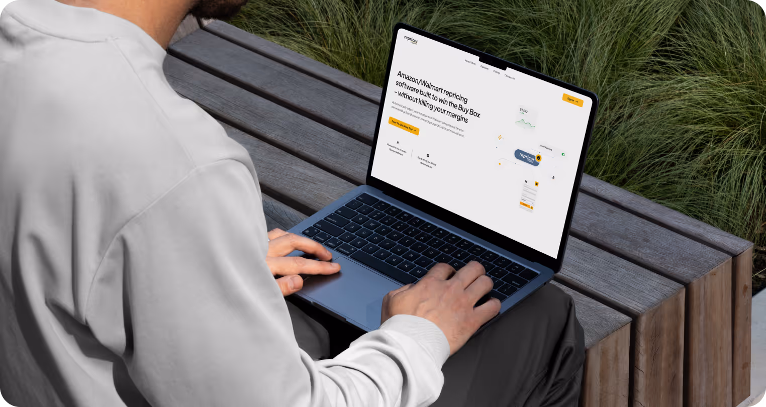 Lifestyle laptop mockup showing a user viewing an Amazon and Walmart repricing software website outdoors, highlighting SaaS product design, Buy Box optimization, and automated pricing management.