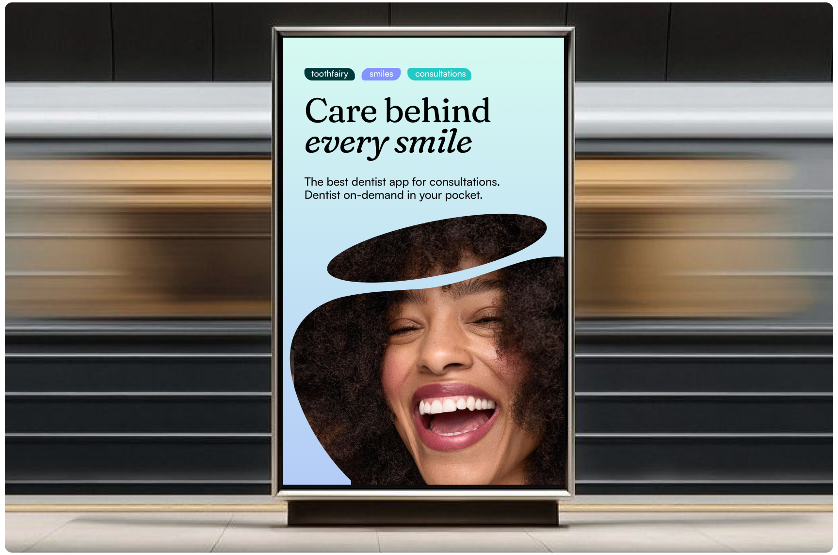 Transit station billboard advertisement for Toothfairy featuring a smiling person and the headline “Care behind every smile,” promoting on-demand dental consultations, accessible oral healthcare, and convenient dentist access through a mobile app.