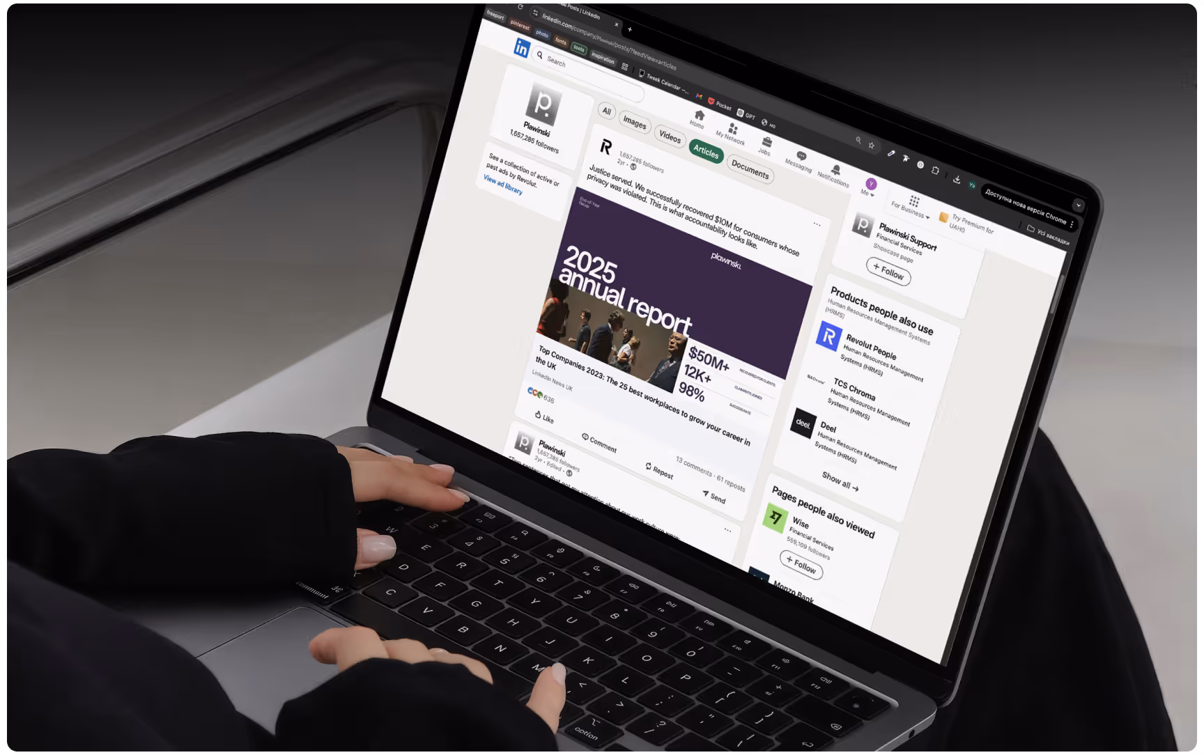 Person using a laptop displaying the Plawinski LinkedIn page with branded content and reports, highlighting professional legal marketing, digital presence, and corporate branding.