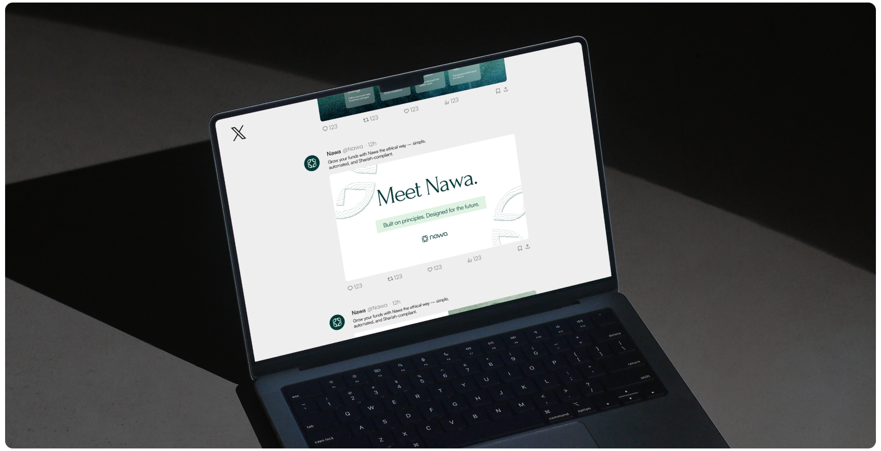 Laptop on a dark surface displays an X social media post promoting “Meet Nawa,” creating a sleek, modern, professional mood.