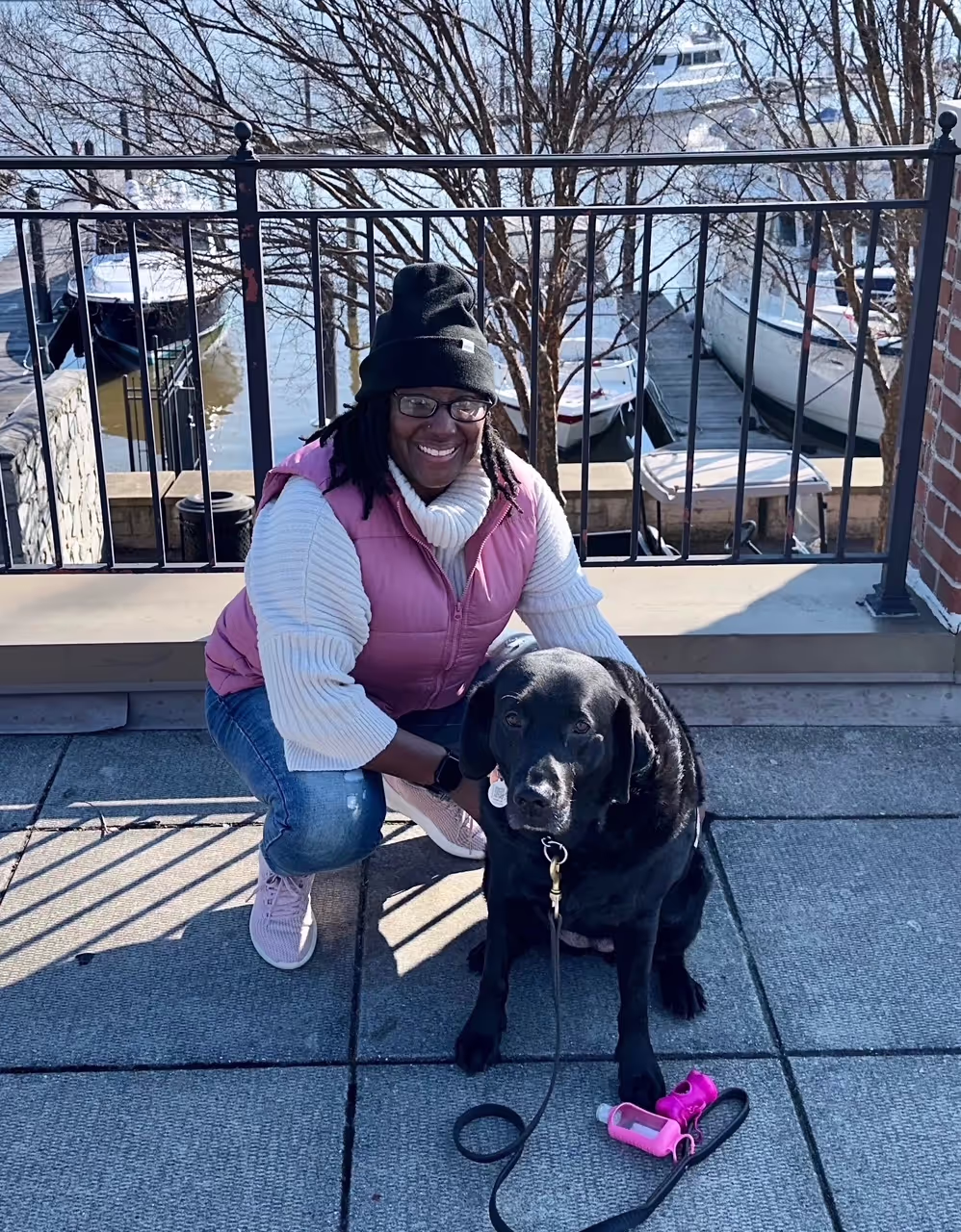 An image of the director with her dog