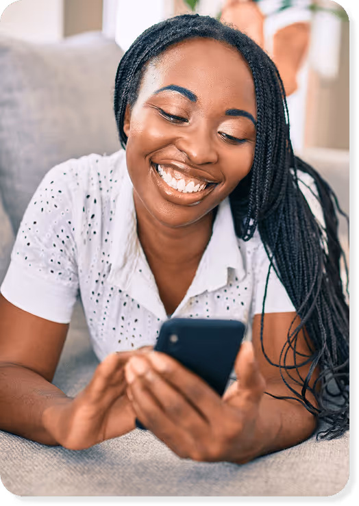 A person happy to be saving and watching their money grow