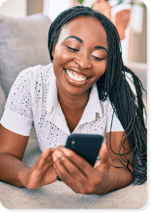 A person happy to be saving and watching their money grow
