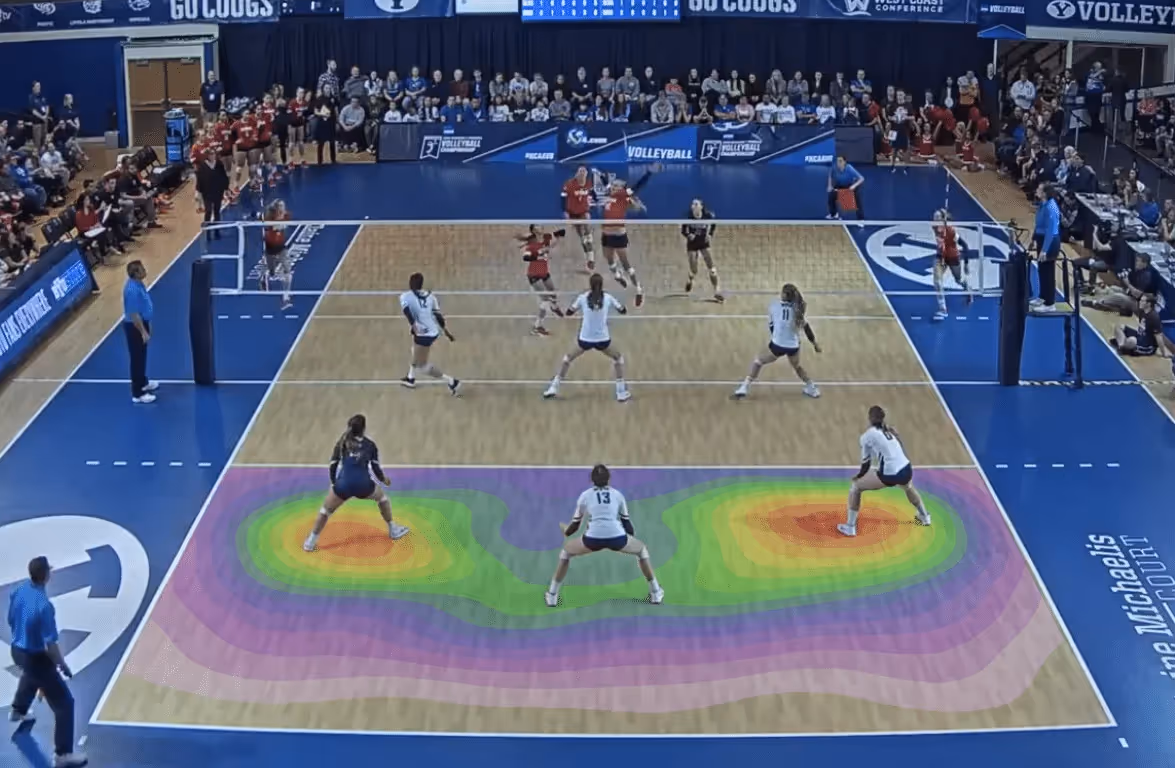 A picture showing a libero in volleyball playing left back.