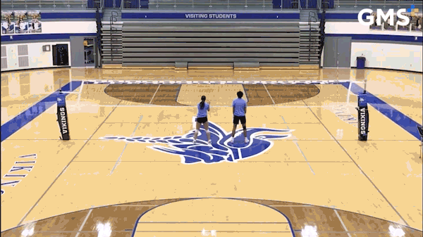 volleyball players executing a drill from a volleyball practice plan 