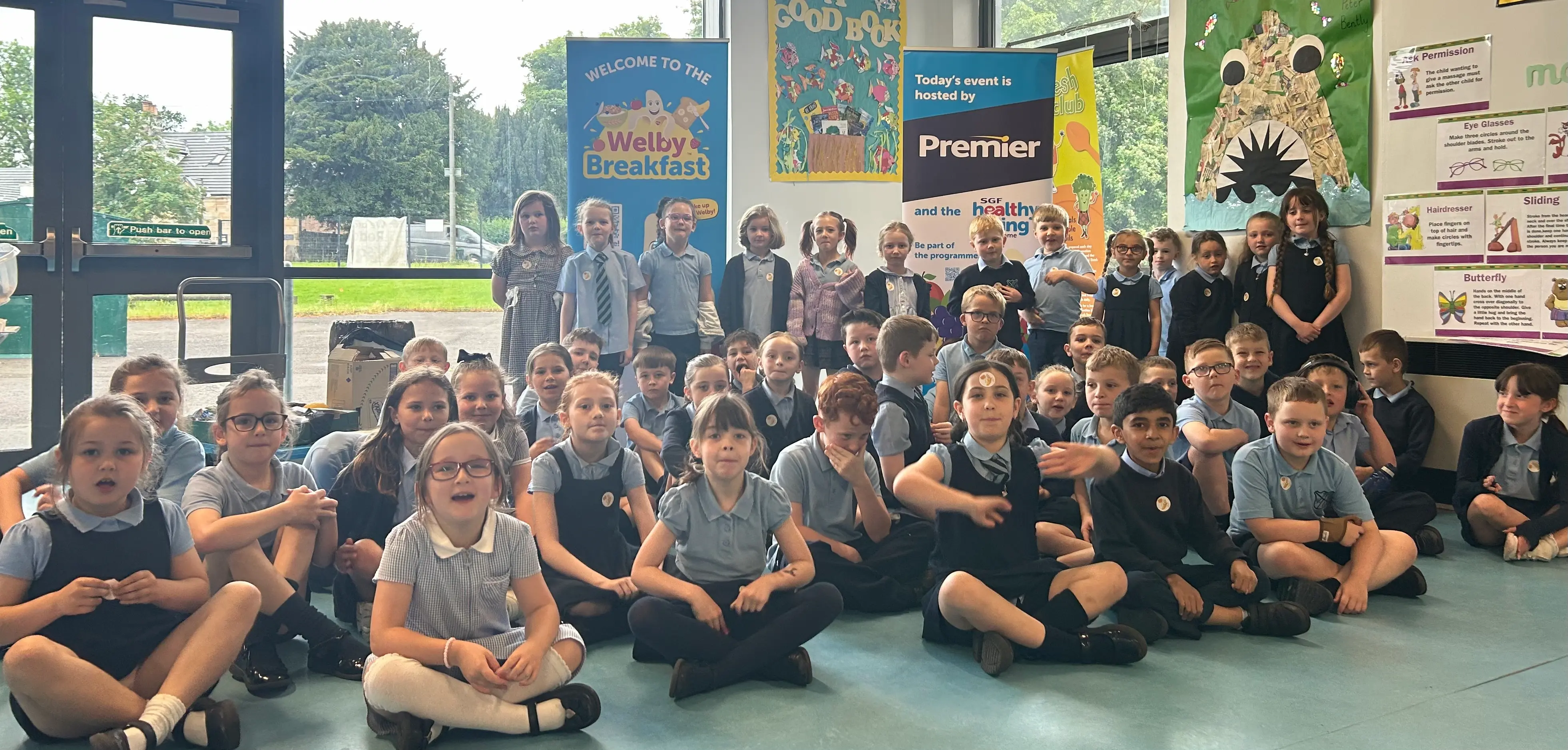 High Blantyre Primary School pupils with Welby Breakfast banners