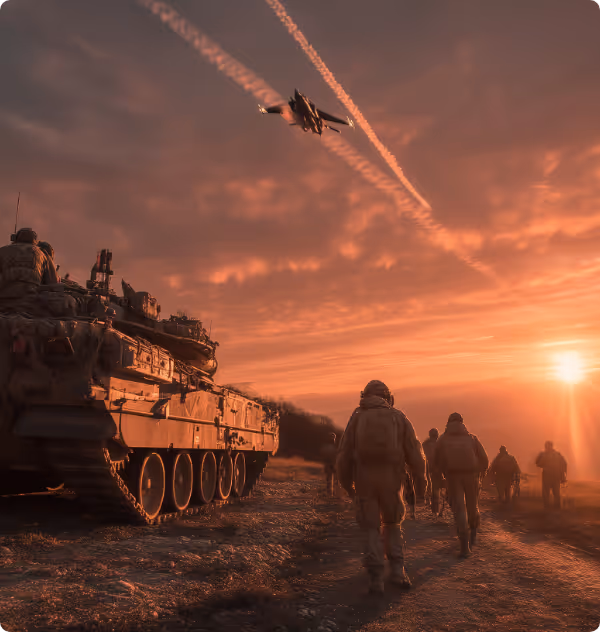 Soldiers walk near a tank at sunset while a fighter jet flies overhead leaving contrails.