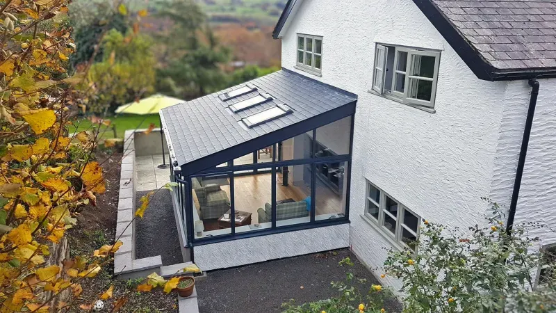 Exterior photograph of a conservatory with a WarmerROOF