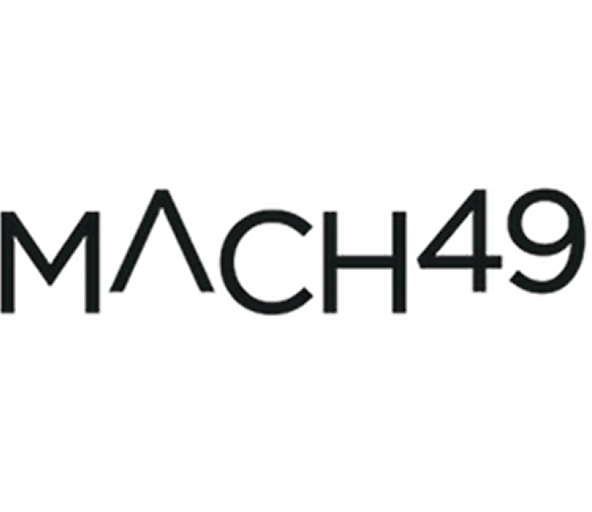 Text logo reading 'MACH49' in black letters on a white background.
