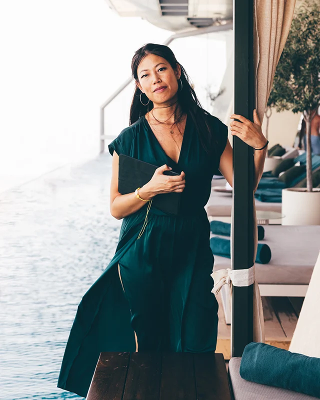 A woman standing in a lobby