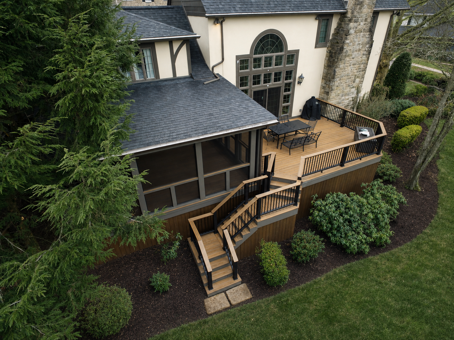 Screened porch and composite deck on a historic Tudor-style home in Mt. Lebanon, PA