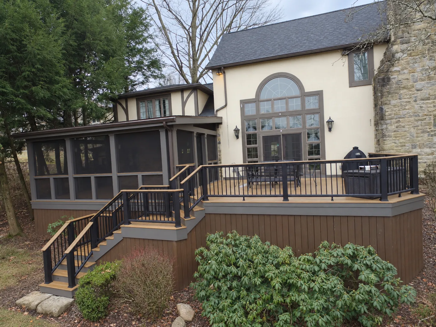 Screened porch and composite deck on a historic Tudor-style home in Mt. Lebanon, PA
