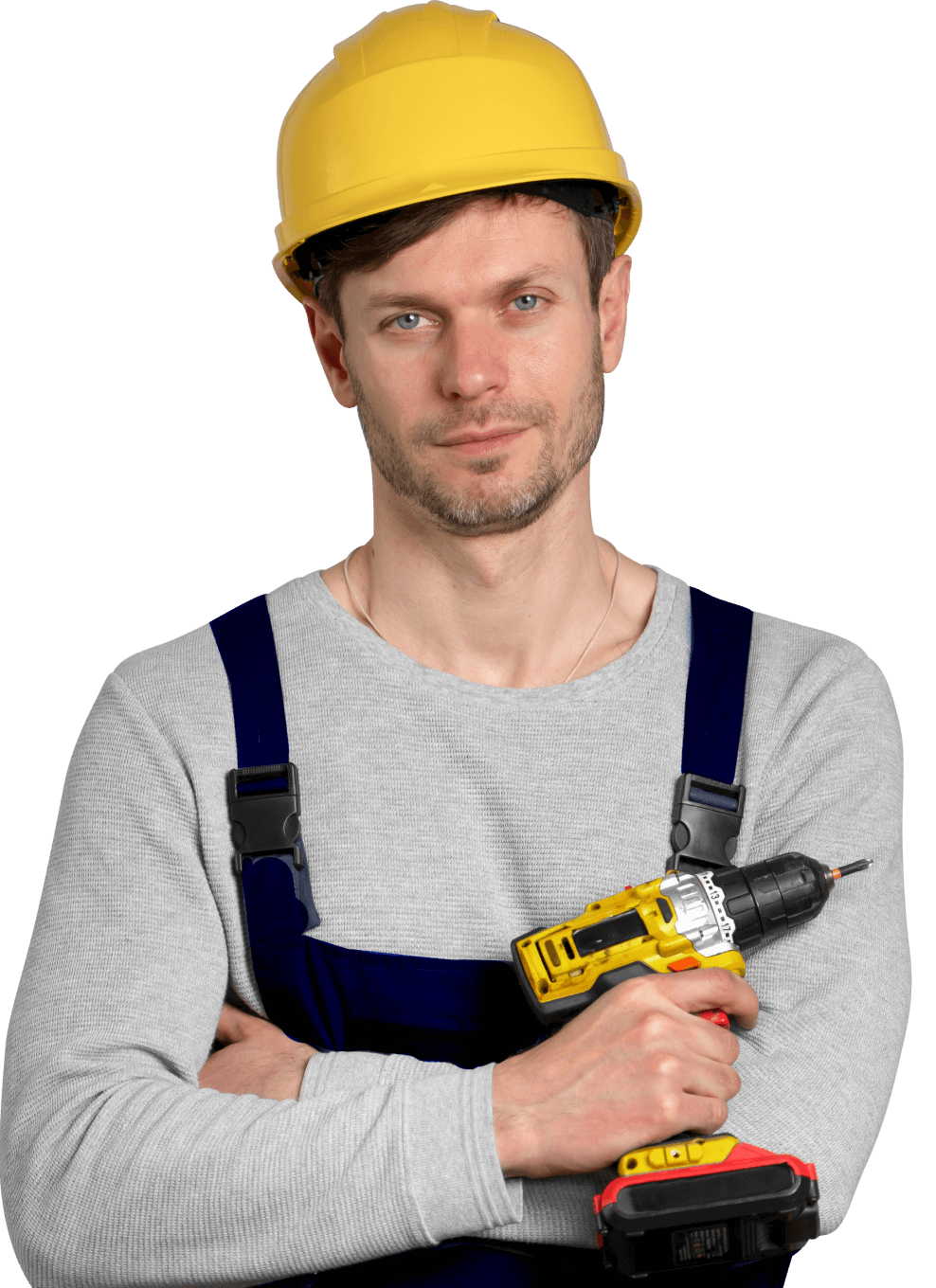 A man wearing a hard hat and holding a drill