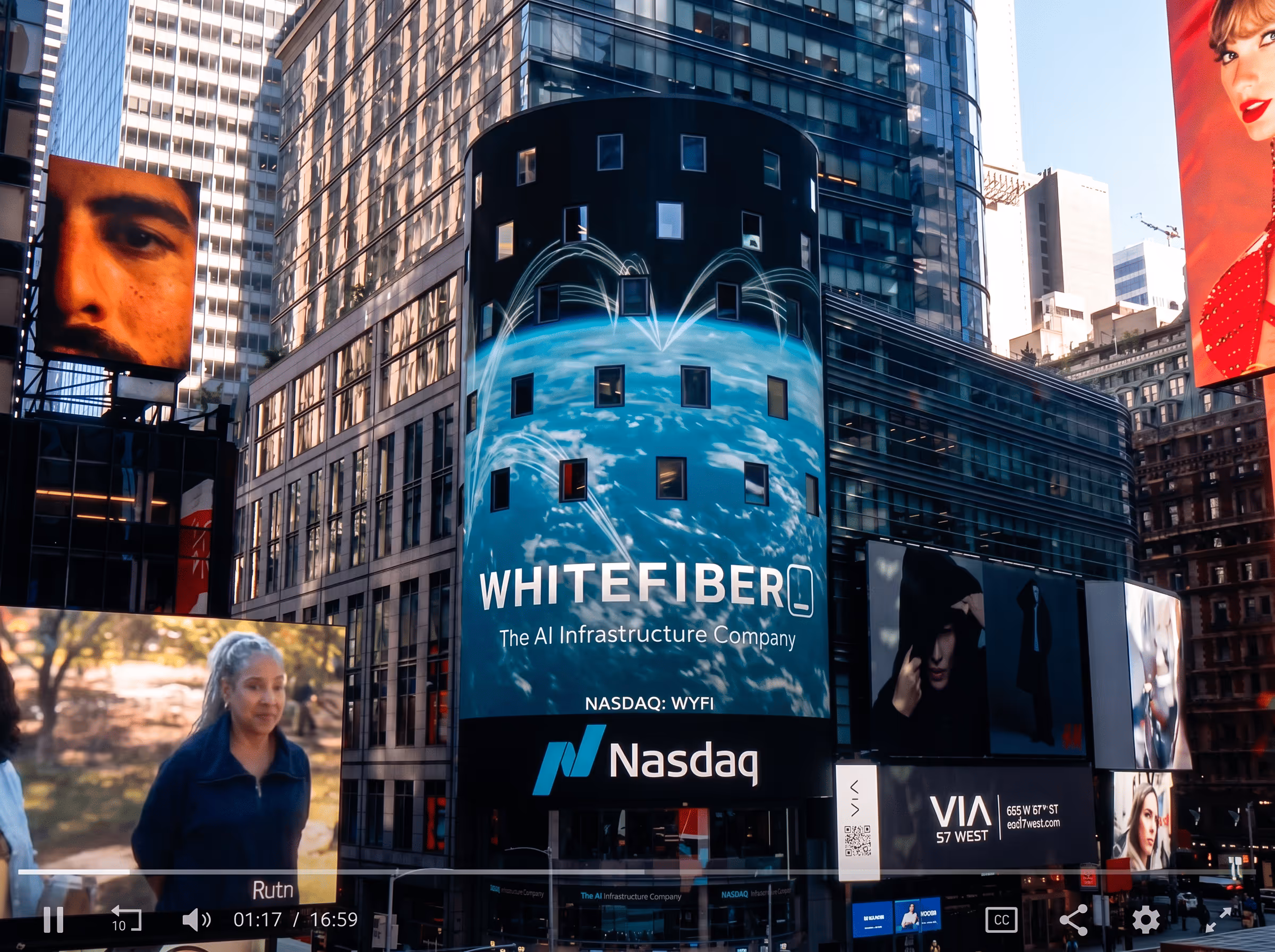 Times Square digital billboard displays WhiteFiber AI infrastructure company ad with Nasdaq branding.