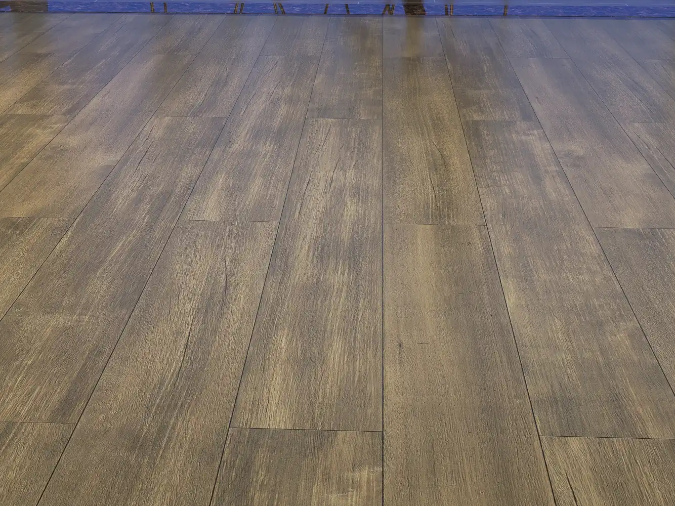 Madeira Teak brings exotic charm to your home with its rich, reddish-brown tones and distinct grain patterns. This luxurious vinyl flooring mimics the beauty of real teak, offering a sophisticated look without the high maintenance. Perfect for adding warmth and elegance to living spaces.
