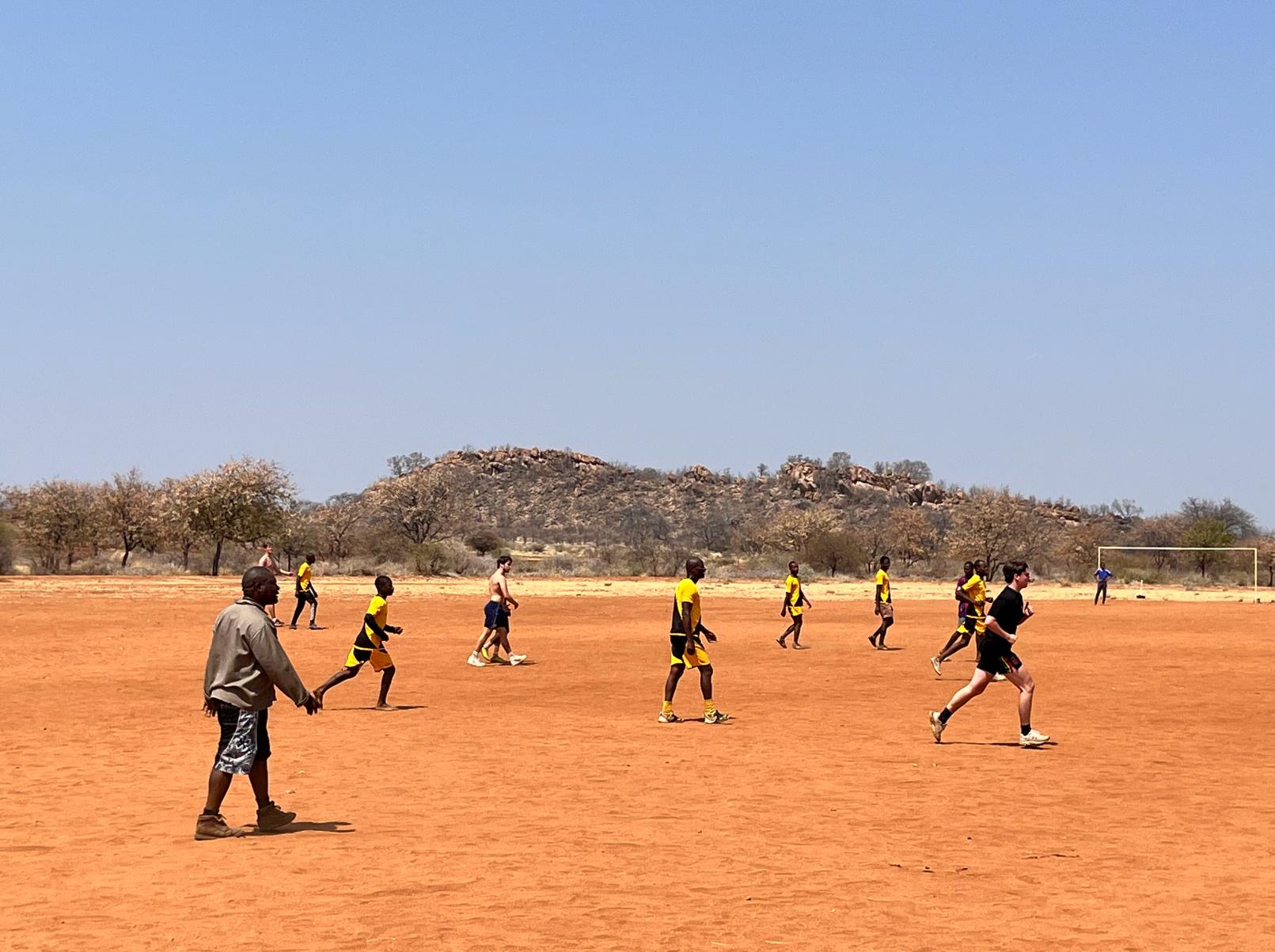 Volunteers playing together with the local community at the Central Tuli Game Reserve in Botswana.