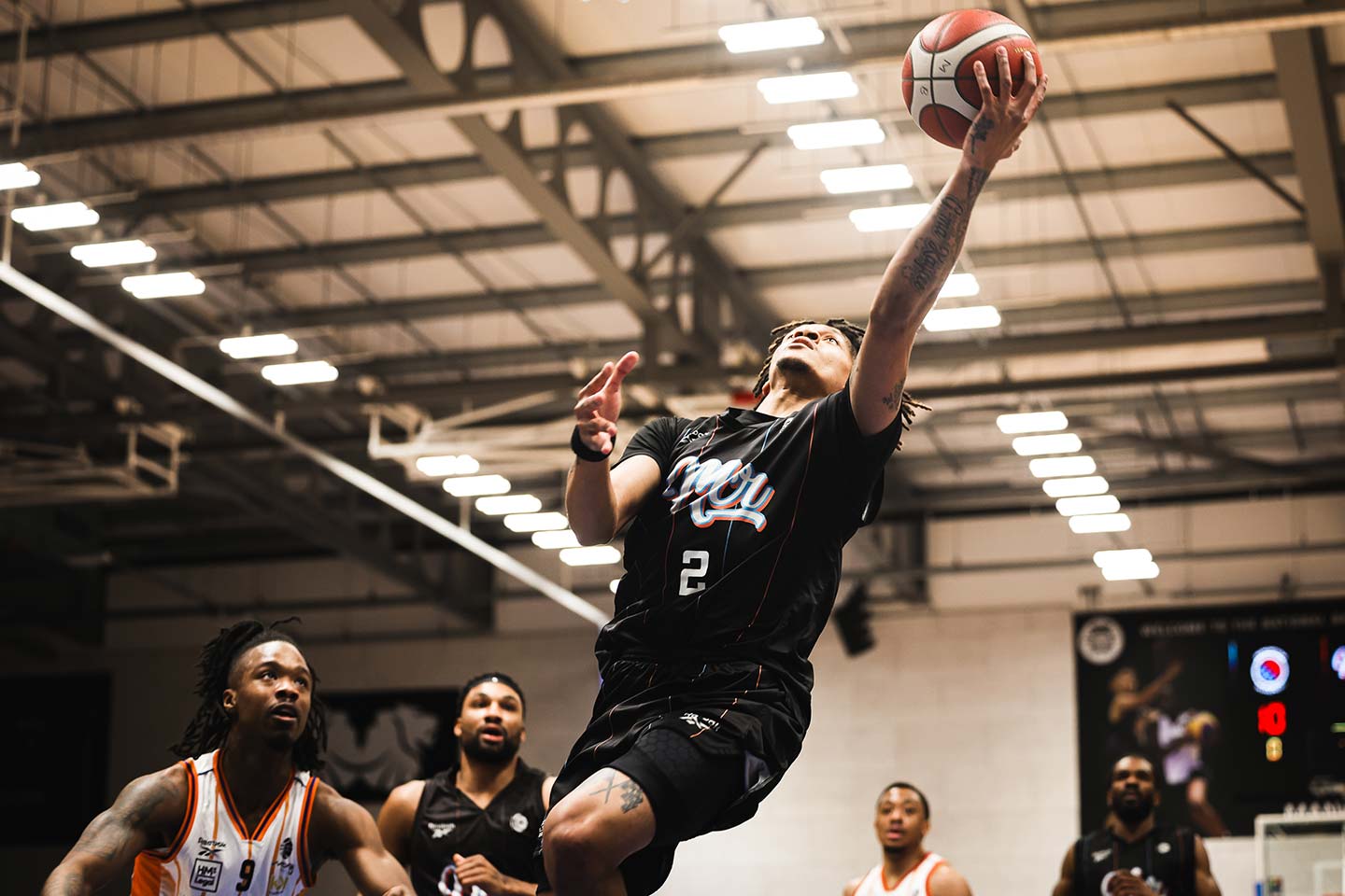 A basketball player getting ready to take a free throw