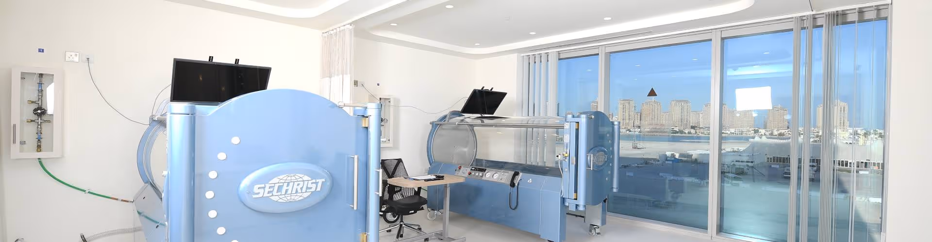 Hyperbaric treatment units in bright clinical space