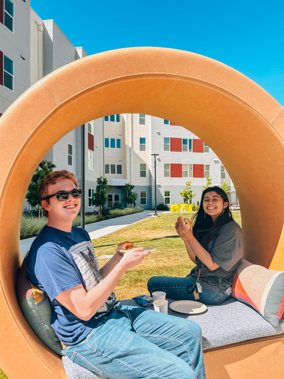 students eating outside