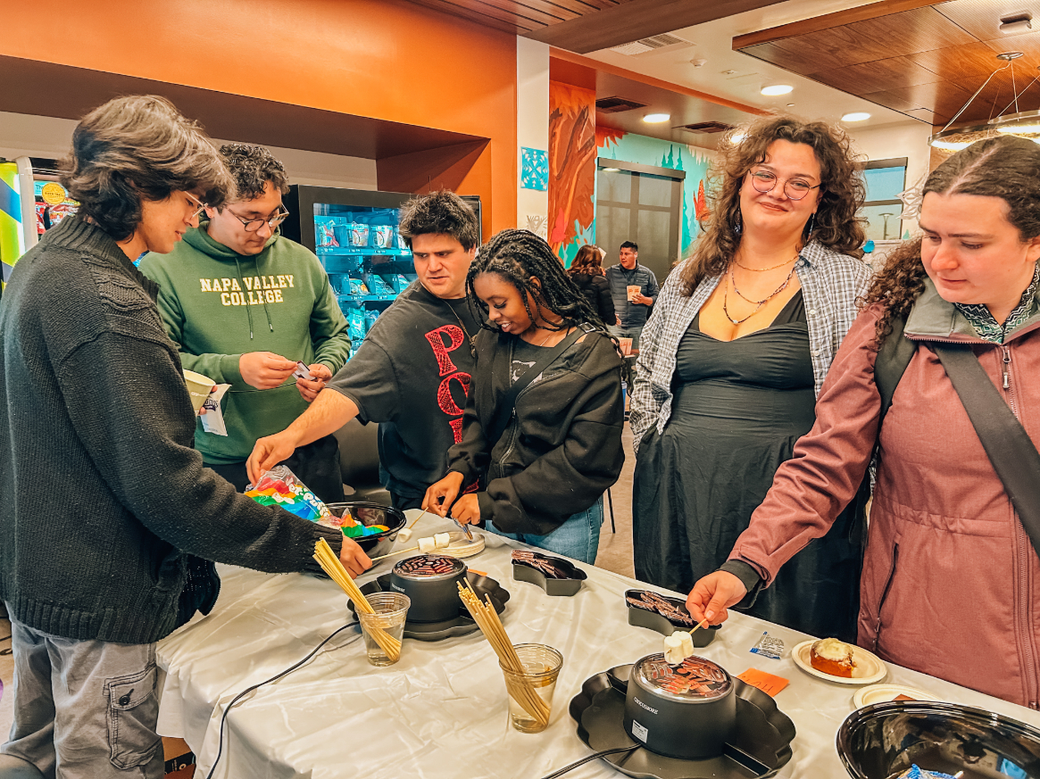 students at fondue set up 