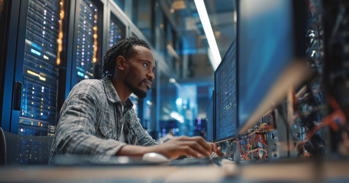 Technician performing proactive maintenance on a server.