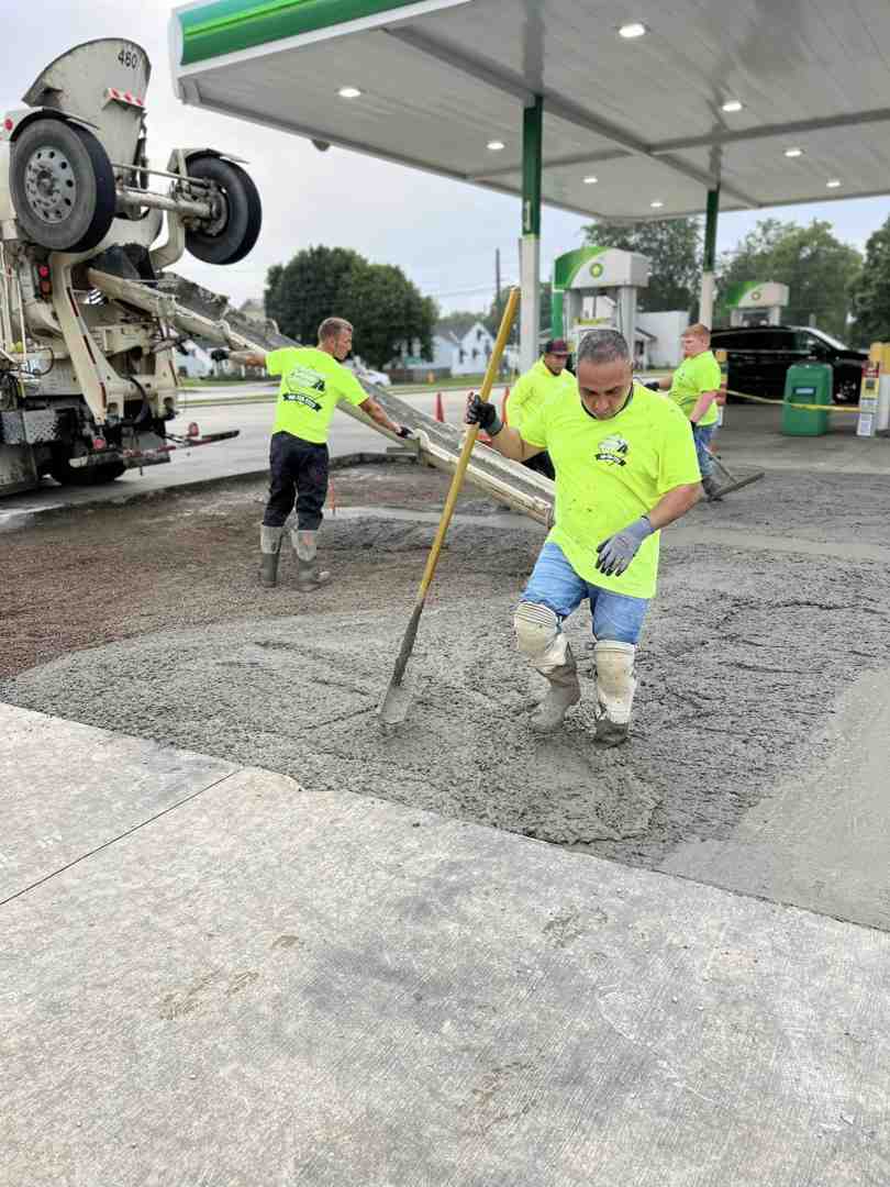 concrete truck pouring concrete into a prepared frame for a driveway - quick concrete installation columbus oh concrete truck pouring concrete into a prepared frame for a driveway - quick concrete installation columbus oh