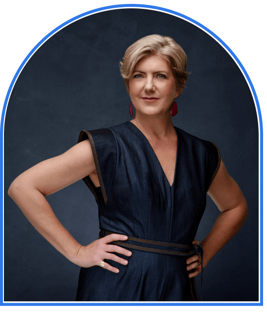 A photo of Erica Priggen Wright against a dark background.