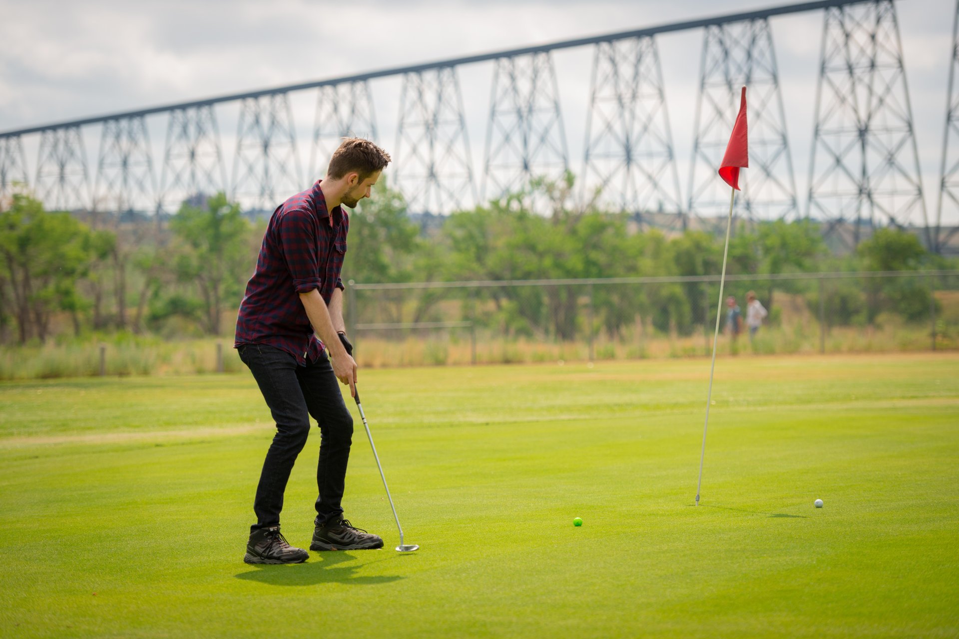 Man golfing in Lethbridge