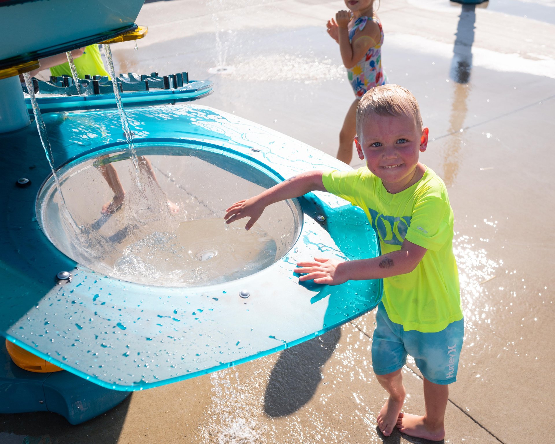 child playing at Lethbridge spray park
