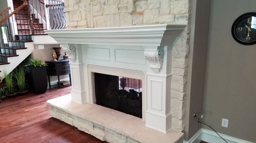 Worker bending metal using a machine