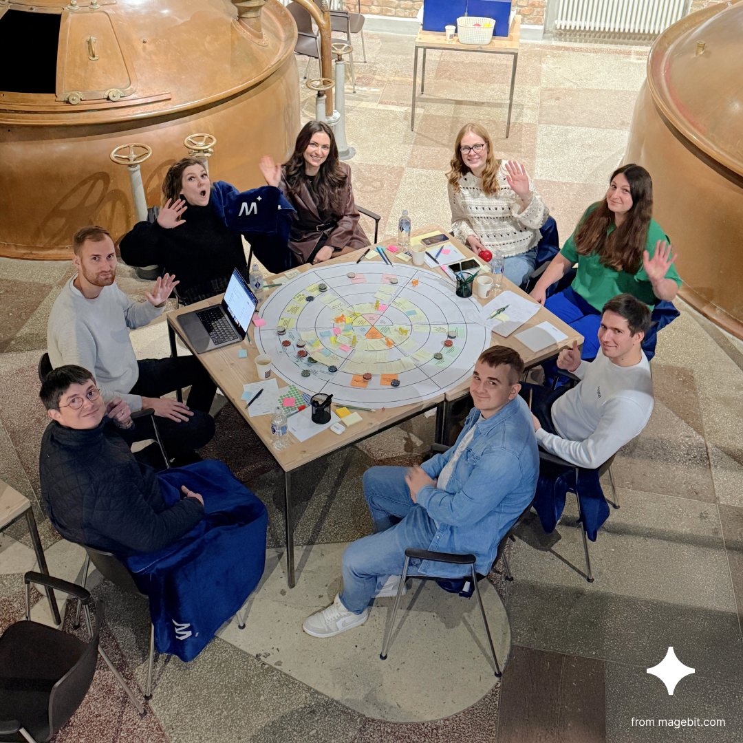 Participants taking part in a board game for company retrospective.
