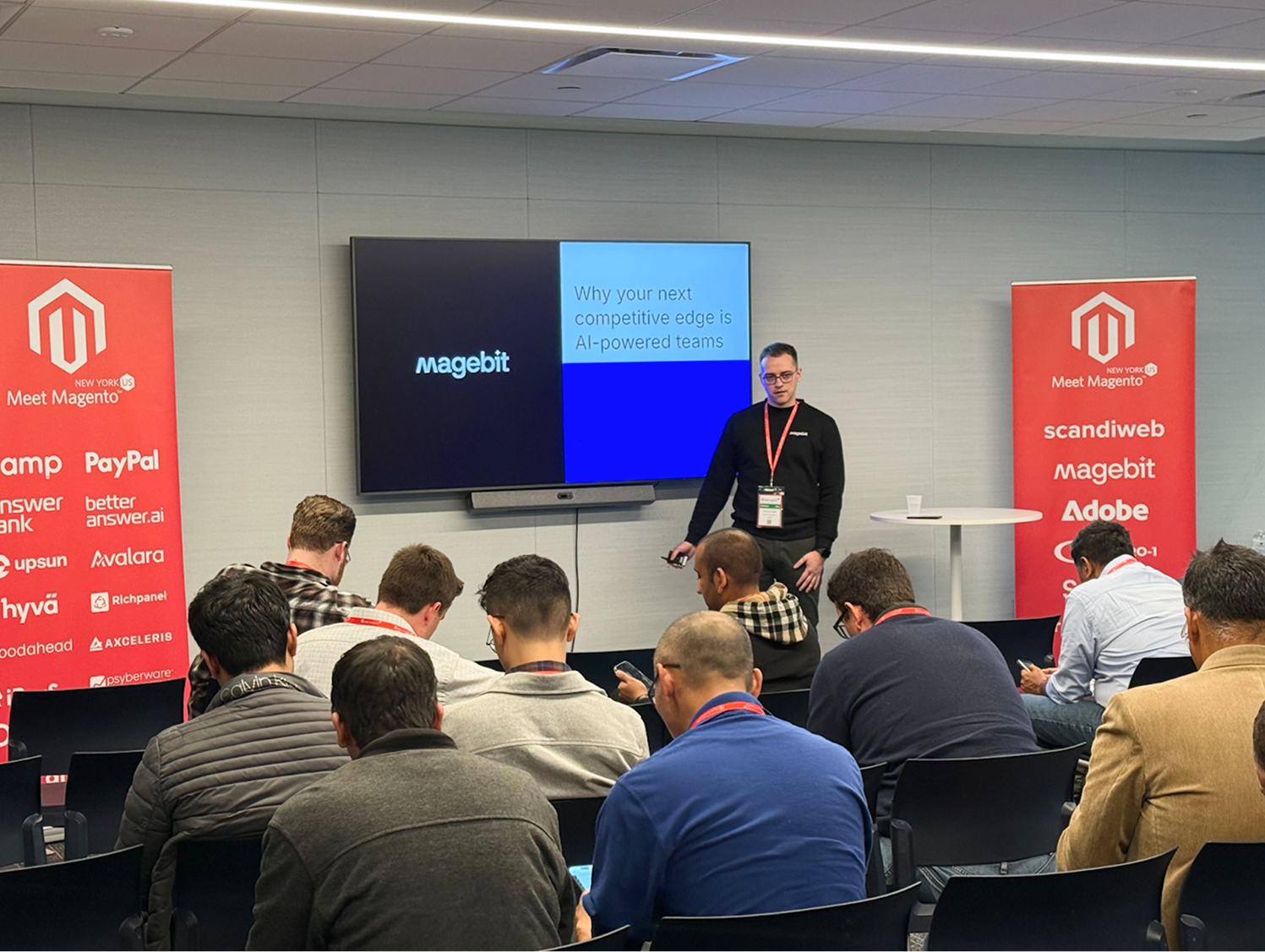 Raimonds giving a talk on “Why Your Next Competitive Edge is AI-Powered Teams”.