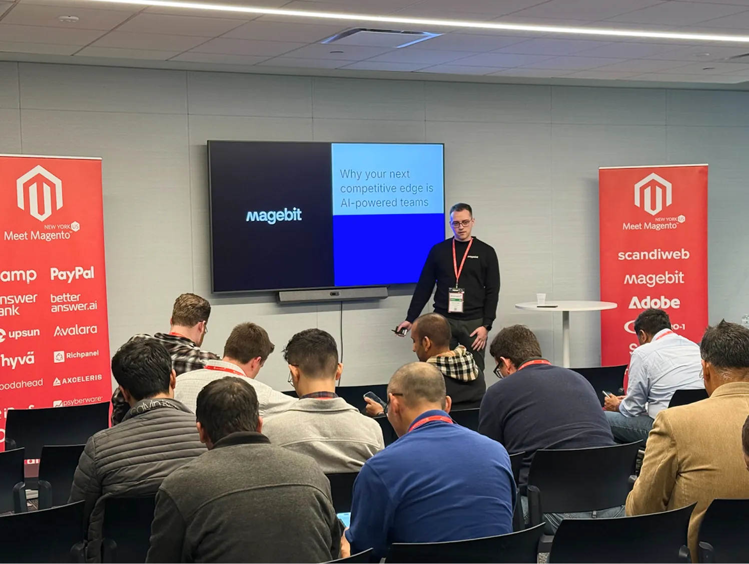 Raimonds giving a talk on “Why Your Next Competitive Edge is AI-Powered Teams”.