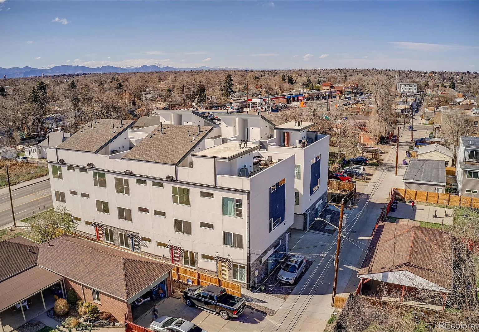 Aerial view of remodeled home in West Colfax, Denver with flat roof and modern facade