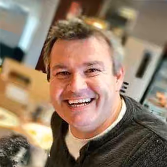 Headshot of Marco Sanvido, VP of Engineering at Robust Intelligence, smiling in a casual setting.