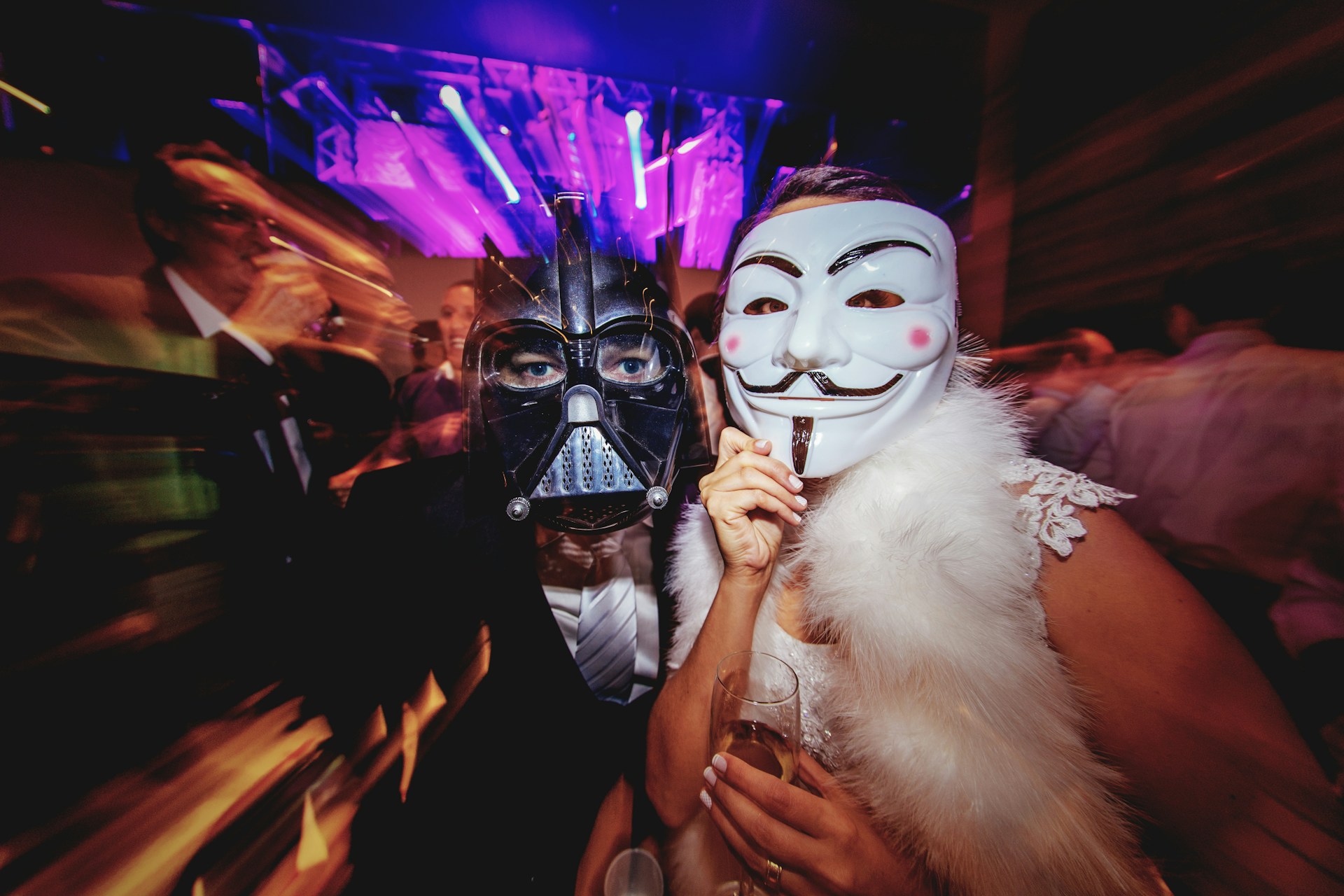 Themed company party with people wearing mask