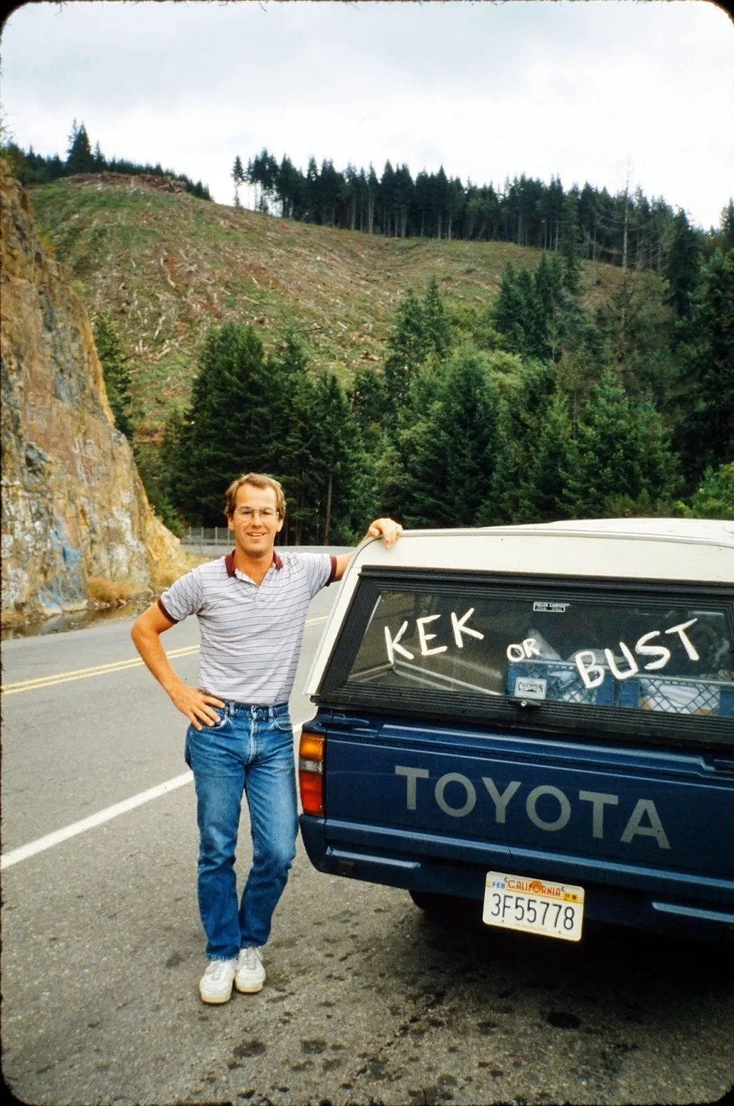 Karl D Kober next to Toyota truck on road trip