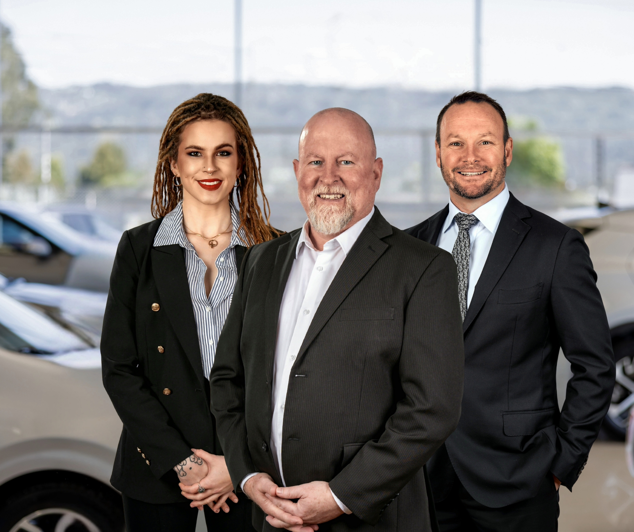 Emily, Jim, Luke car buying slider image laptop