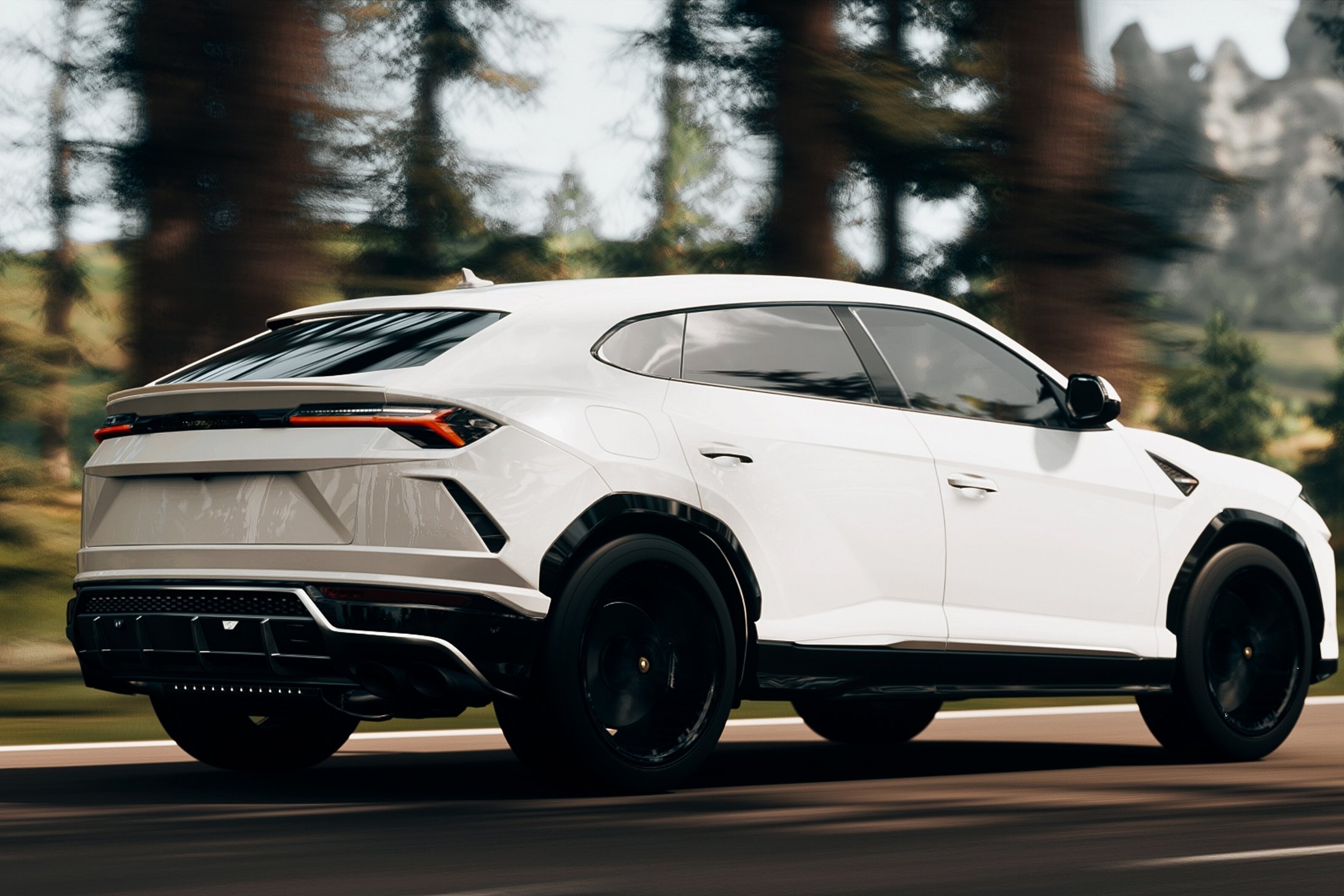 White SUV car driving on a road with blurred forest background.