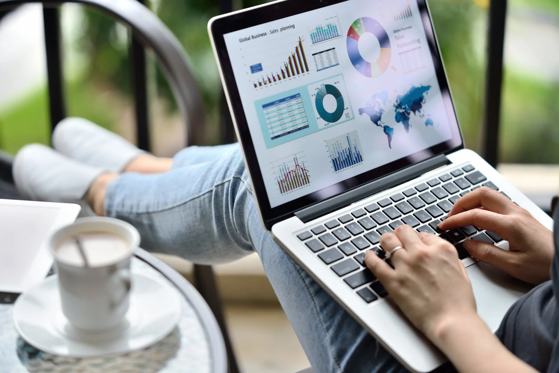 Person analyzing marketing analytics and campaign performance charts on a laptop, demonstrating professional Digital Advertising Management Dallas services.