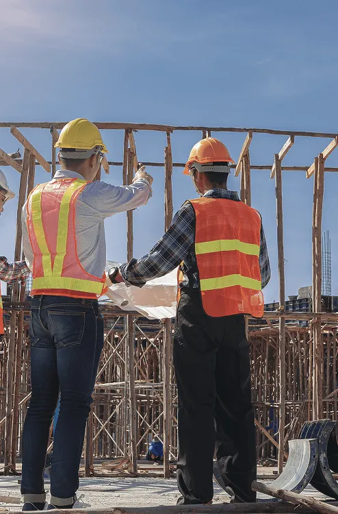 Image of engineers discussing the structure integrity