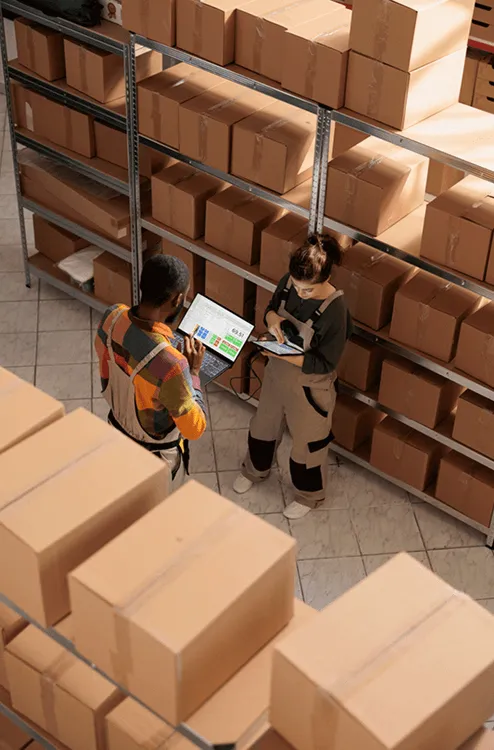 Image of two workers conducting a inventory check