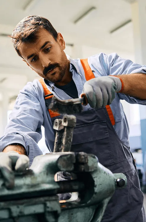 image of a mechanic working with vehicles