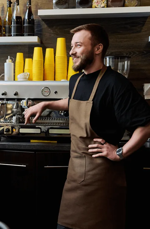 Image of a barista smiling